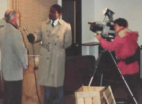 Pastor Paul S Arnopoulos is interviewed by the TV station about the Thanksgiving GiveAway in 1985.