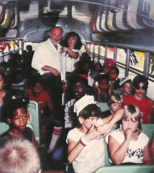 Pastor Paul S Arnopoulos and Jeanine Durand Arnopoulos take children to the All Star Baseball Game.