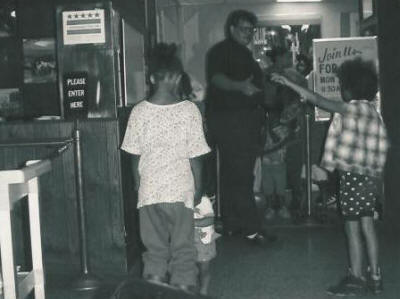 Jonathan was the busy Host who seated people and many children in the dining room.