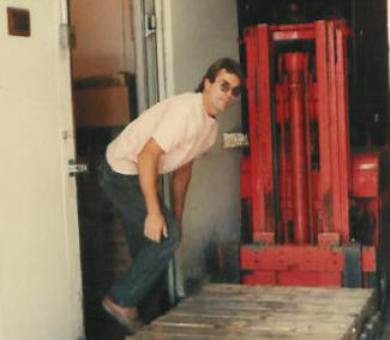 Jim Robertson longtime church member turns into a dedicated staff member here loading the cooler with fresh food.