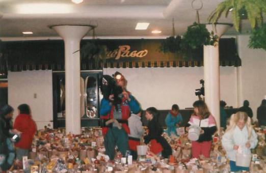 TV recording the Thanksgiving GiveAway preparation by young school children in 1985.