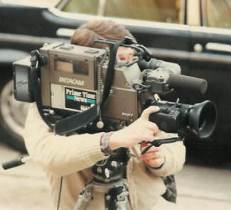 TV cameraman at the Thanksgiving GiveAway in 1985.